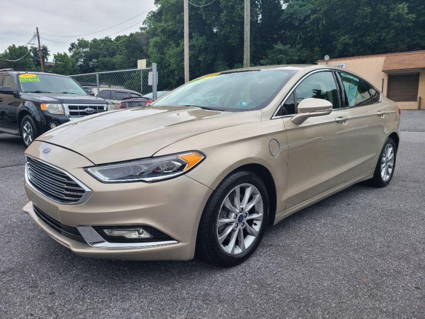 2017 TAN FORD FUSION SE PHEV (3FA6P0PU2HR) with an 2.0L engine, Continuously Variable transmission, located at 117 North Cameron Street, Harrisburg, PA, 17101, (717) 963-8962, 40.267021, -76.875351 - WE FINANCE!!! Good Credit/ Bad Credit/ No Credit - ALL Trade-Ins Welcomed!!! ***Guaranteed Credit Approval*** APPLY ONLINE or CALL us TODAY ;) Internet Prices and Marketplace Prices are SPECIAL discounted ***CASH DEALS*** Retail Prices are higher. Please call us to discuss your cash and finan - Photo#0