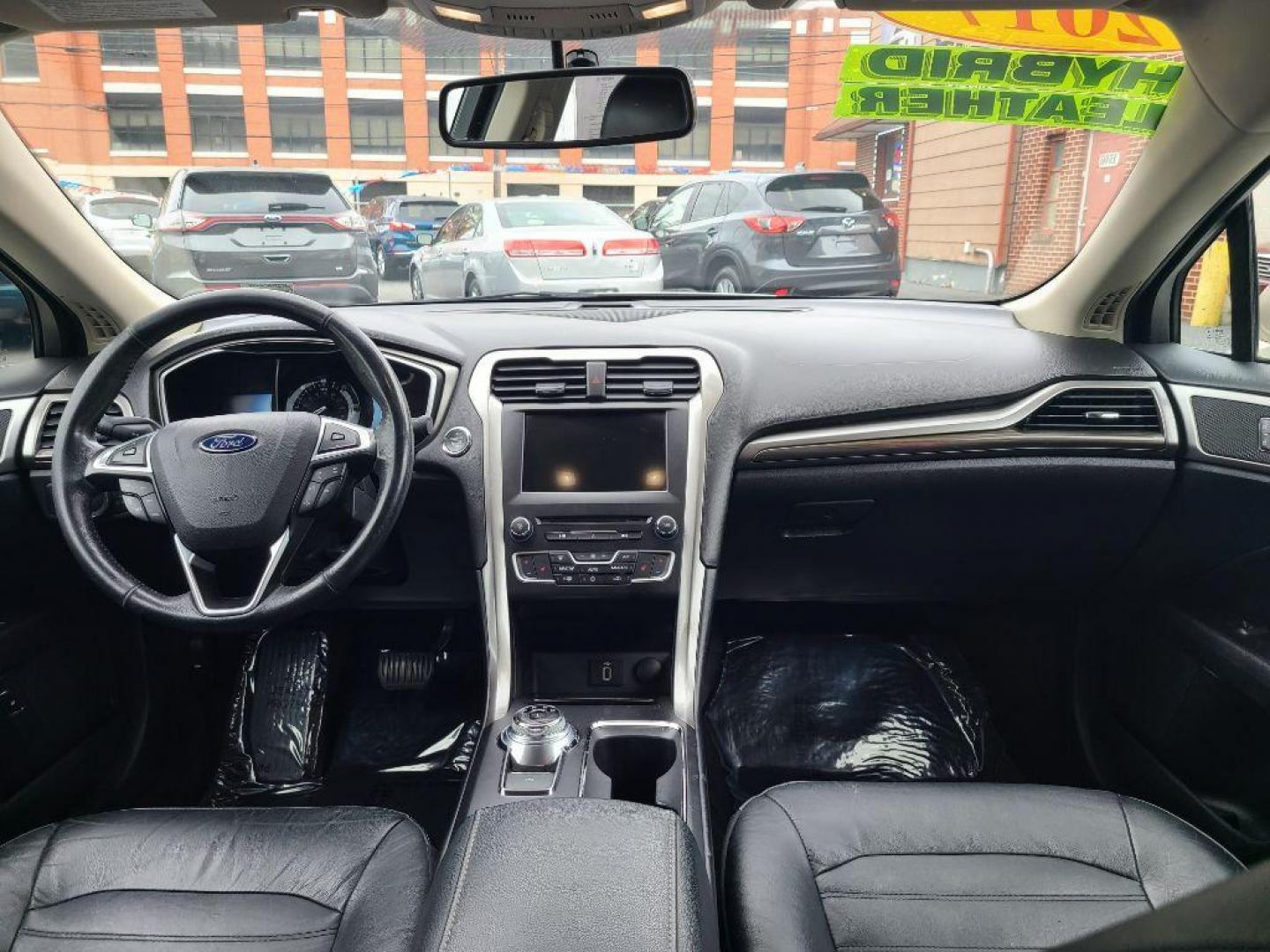 2017 TAN FORD FUSION SE PHEV (3FA6P0PU2HR) with an 2.0L engine, Continuously Variable transmission, located at 117 North Cameron Street, Harrisburg, PA, 17101, (717) 963-8962, 40.267021, -76.875351 - WE FINANCE!!! Good Credit/ Bad Credit/ No Credit - ALL Trade-Ins Welcomed!!! ***Guaranteed Credit Approval*** APPLY ONLINE or CALL us TODAY ;) Internet Prices and Marketplace Prices are SPECIAL discounted ***CASH DEALS*** Retail Prices are higher. Please call us to discuss your cash and finan - Photo#9