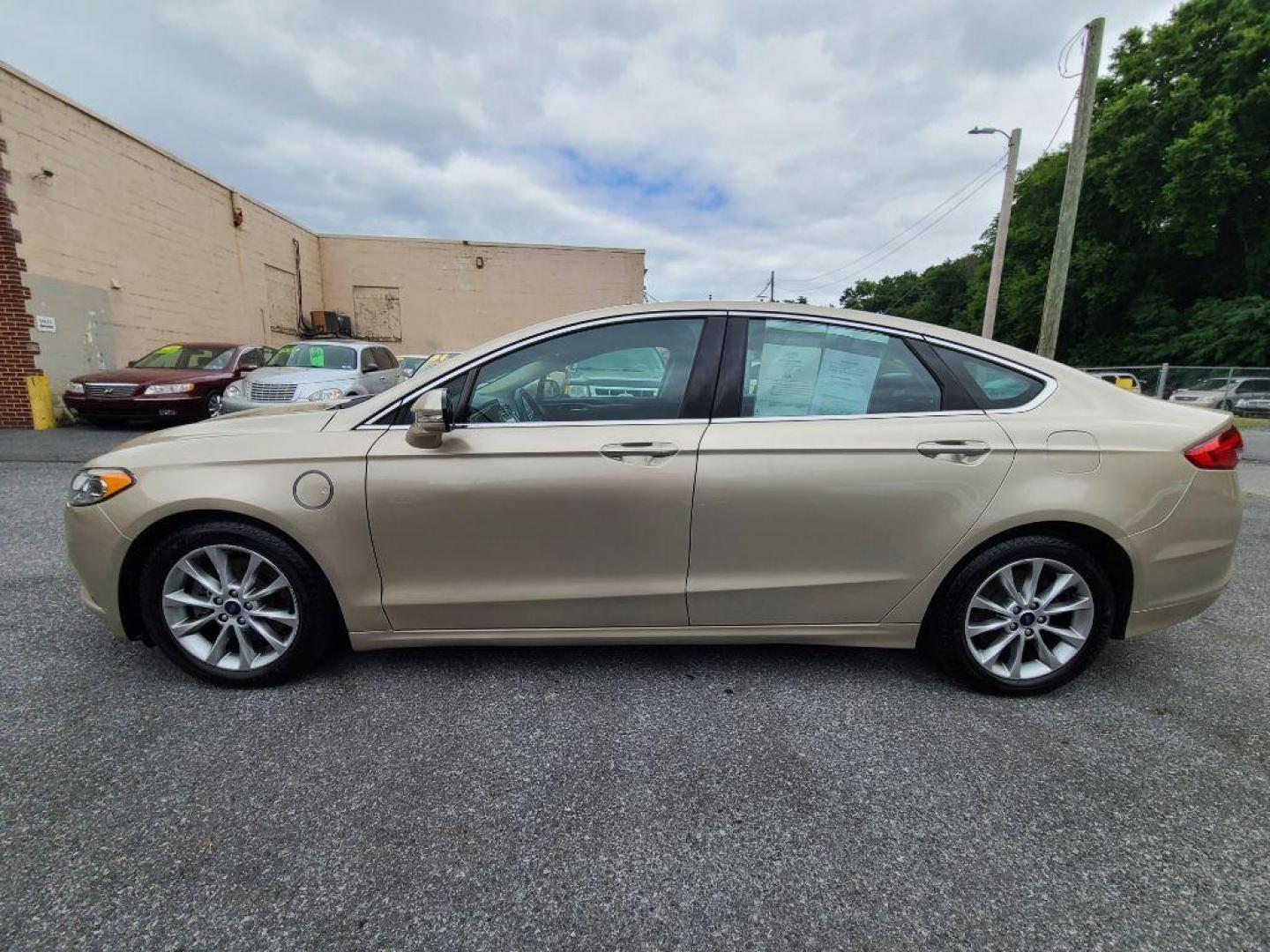 2017 TAN FORD FUSION SE PHEV (3FA6P0PU2HR) with an 2.0L engine, Continuously Variable transmission, located at 117 North Cameron Street, Harrisburg, PA, 17101, (717) 963-8962, 40.267021, -76.875351 - WE FINANCE!!! Good Credit/ Bad Credit/ No Credit - ALL Trade-Ins Welcomed!!! ***Guaranteed Credit Approval*** APPLY ONLINE or CALL us TODAY ;) Internet Prices and Marketplace Prices are SPECIAL discounted ***CASH DEALS*** Retail Prices are higher. Please call us to discuss your cash and finan - Photo#1