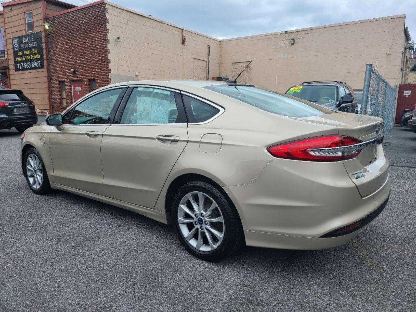 2017 TAN FORD FUSION SE PHEV (3FA6P0PU2HR) with an 2.0L engine, Continuously Variable transmission, located at 117 North Cameron Street, Harrisburg, PA, 17101, (717) 963-8962, 40.267021, -76.875351 - WE FINANCE!!! Good Credit/ Bad Credit/ No Credit - ALL Trade-Ins Welcomed!!! ***Guaranteed Credit Approval*** APPLY ONLINE or CALL us TODAY ;) Internet Prices and Marketplace Prices are SPECIAL discounted ***CASH DEALS*** Retail Prices are higher. Please call us to discuss your cash and finan - Photo#2