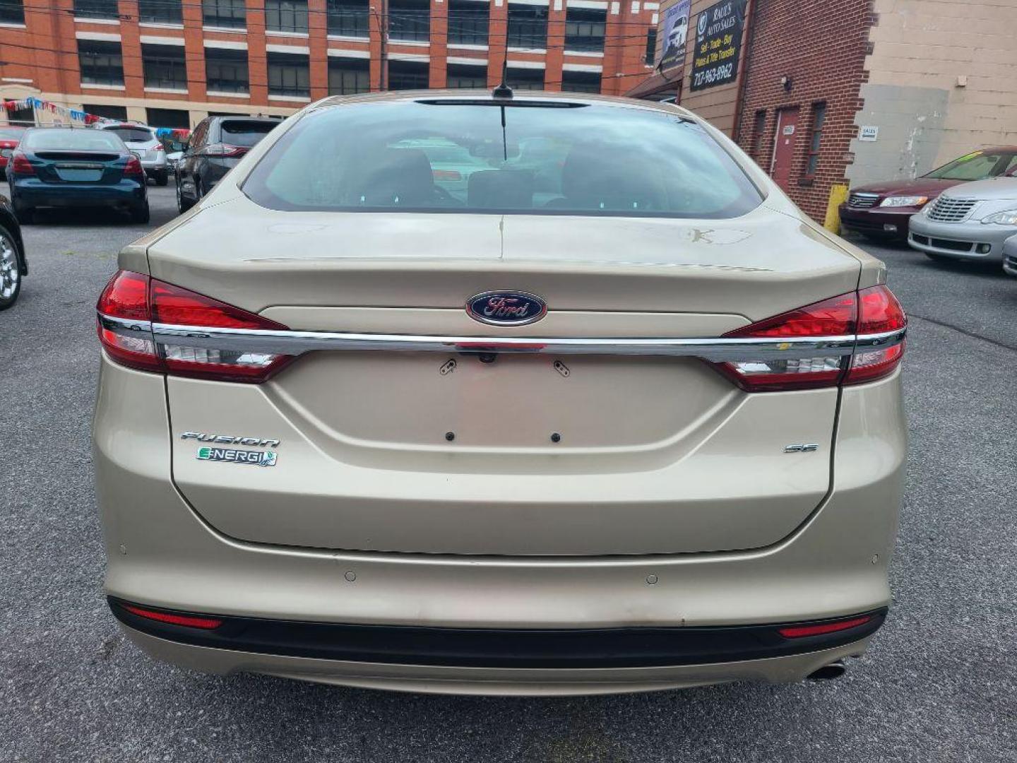 2017 TAN FORD FUSION SE PHEV (3FA6P0PU2HR) with an 2.0L engine, Continuously Variable transmission, located at 117 North Cameron Street, Harrisburg, PA, 17101, (717) 963-8962, 40.267021, -76.875351 - WE FINANCE!!! Good Credit/ Bad Credit/ No Credit - ALL Trade-Ins Welcomed!!! ***Guaranteed Credit Approval*** APPLY ONLINE or CALL us TODAY ;) Internet Prices and Marketplace Prices are SPECIAL discounted ***CASH DEALS*** Retail Prices are higher. Please call us to discuss your cash and finan - Photo#3