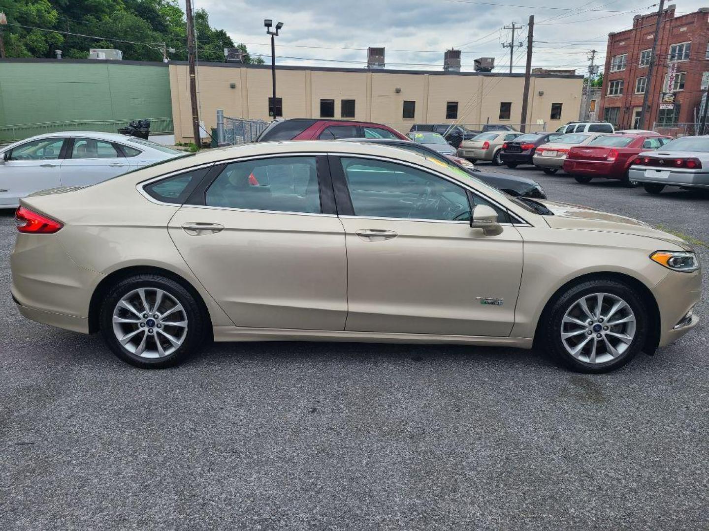 2017 TAN FORD FUSION SE PHEV (3FA6P0PU2HR) with an 2.0L engine, Continuously Variable transmission, located at 117 North Cameron Street, Harrisburg, PA, 17101, (717) 963-8962, 40.267021, -76.875351 - WE FINANCE!!! Good Credit/ Bad Credit/ No Credit - ALL Trade-Ins Welcomed!!! ***Guaranteed Credit Approval*** APPLY ONLINE or CALL us TODAY ;) Internet Prices and Marketplace Prices are SPECIAL discounted ***CASH DEALS*** Retail Prices are higher. Please call us to discuss your cash and finan - Photo#5