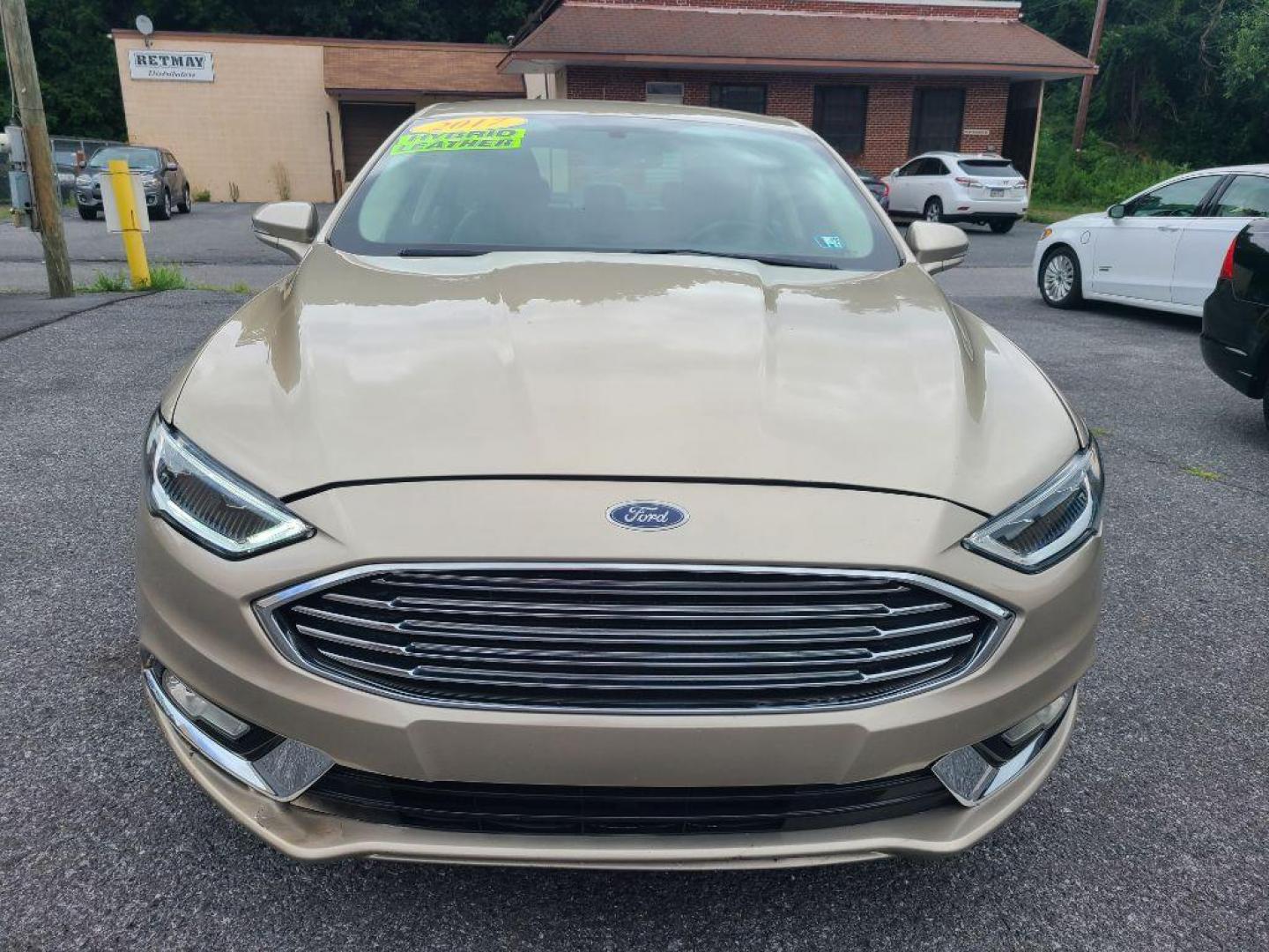 2017 TAN FORD FUSION SE PHEV (3FA6P0PU2HR) with an 2.0L engine, Continuously Variable transmission, located at 117 North Cameron Street, Harrisburg, PA, 17101, (717) 963-8962, 40.267021, -76.875351 - WE FINANCE!!! Good Credit/ Bad Credit/ No Credit - ALL Trade-Ins Welcomed!!! ***Guaranteed Credit Approval*** APPLY ONLINE or CALL us TODAY ;) Internet Prices and Marketplace Prices are SPECIAL discounted ***CASH DEALS*** Retail Prices are higher. Please call us to discuss your cash and finan - Photo#7