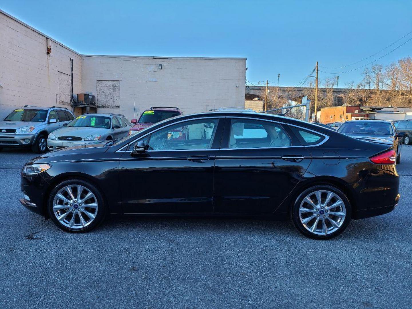 2017 BLACK FORD FUSION PLATINUM (3FA6P0D98HR) with an 2.0L engine, Automatic transmission, located at 7981 Paxton Street, Harrisburg, PA, 17111, (717) 561-2926, 40.261490, -76.749229 - WE FINANCE!!! Good Credit/ Bad Credit/ No Credit - ALL Trade-Ins Welcomed!!! ***Guaranteed Credit Approval*** APPLY ONLINE or CALL us TODAY ;) Internet Prices and Marketplace Prices are SPECIAL discounted ***CASH DEALS*** Retail Prices are higher. Please call us to discuss your cash and finan - Photo#1