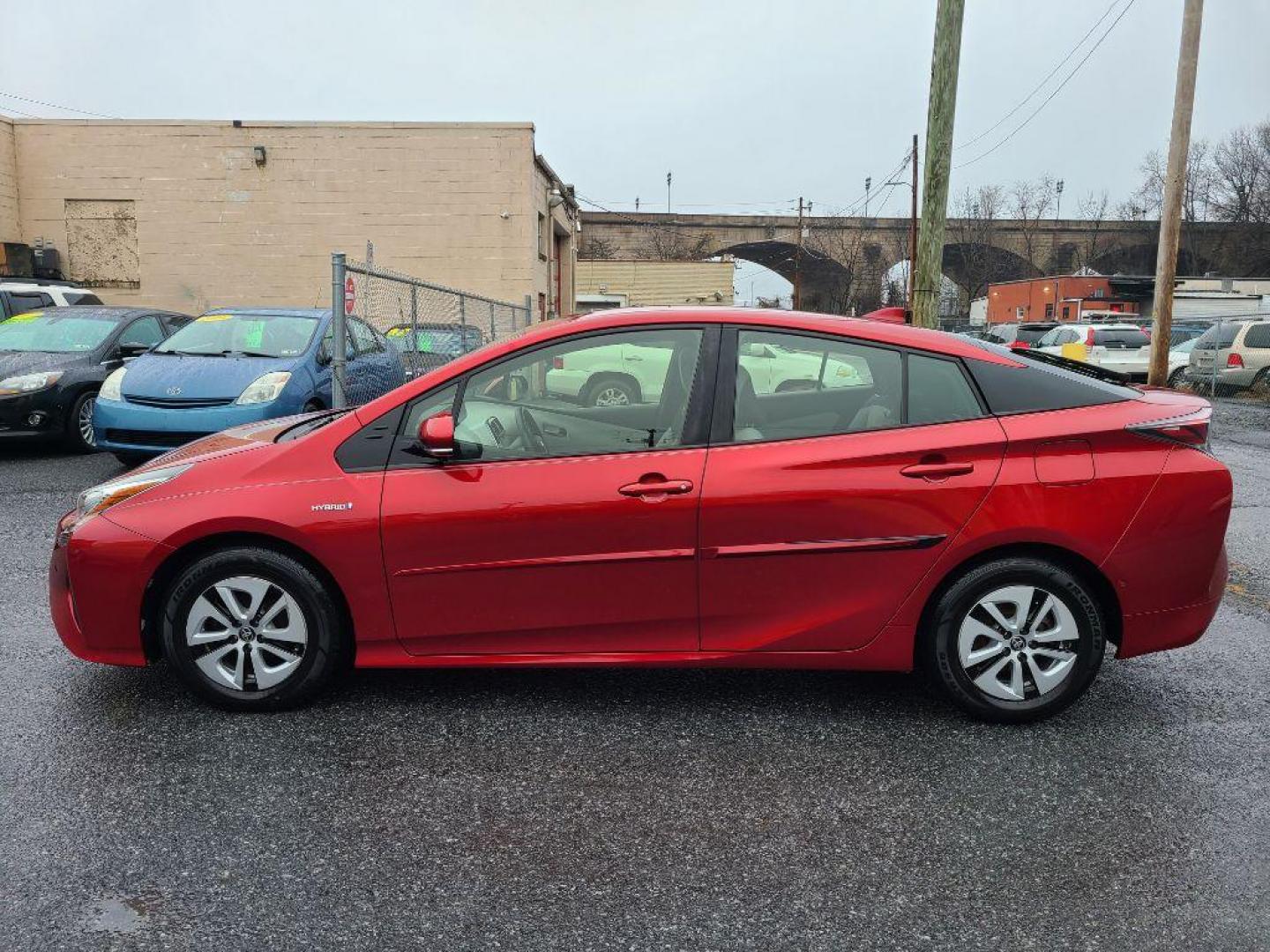 2017 RED TOYOTA PRIUS THREE HATACHBACK (JTDKARFU7H3) with an 1.8L engine, Continuously Variable transmission, located at 7981 Paxton Street, Harrisburg, PA, 17111, (717) 561-2926, 40.261490, -76.749229 - WE FINANCE!!! Good Credit/ Bad Credit/ No Credit - ALL Trade-Ins Welcomed!!! ***Guaranteed Credit Approval*** APPLY ONLINE or CALL us TODAY ;) Internet Prices and Marketplace Prices are SPECIAL discounted ***CASH DEALS*** Retail Prices are higher. Please call us to discuss your cash and finan - Photo#1