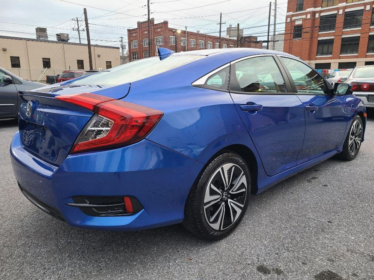 2018 BLUE HONDA CIVIC EXL (2HGFC1F72JH) with an 1.5L engine, Continuously Variable transmission, located at 7981 Paxton Street, Harrisburg, PA, 17111, (717) 561-2926, 40.261490, -76.749229 - WE FINANCE!!! Good Credit/ Bad Credit/ No Credit - ALL Trade-Ins Welcomed!!! ***Guaranteed Credit Approval*** APPLY ONLINE or CALL us TODAY ;) Internet Prices and Marketplace Prices are SPECIAL discounted ***CASH DEALS*** Retail Prices are higher. Please call us to discuss your cash and finan - Photo#4